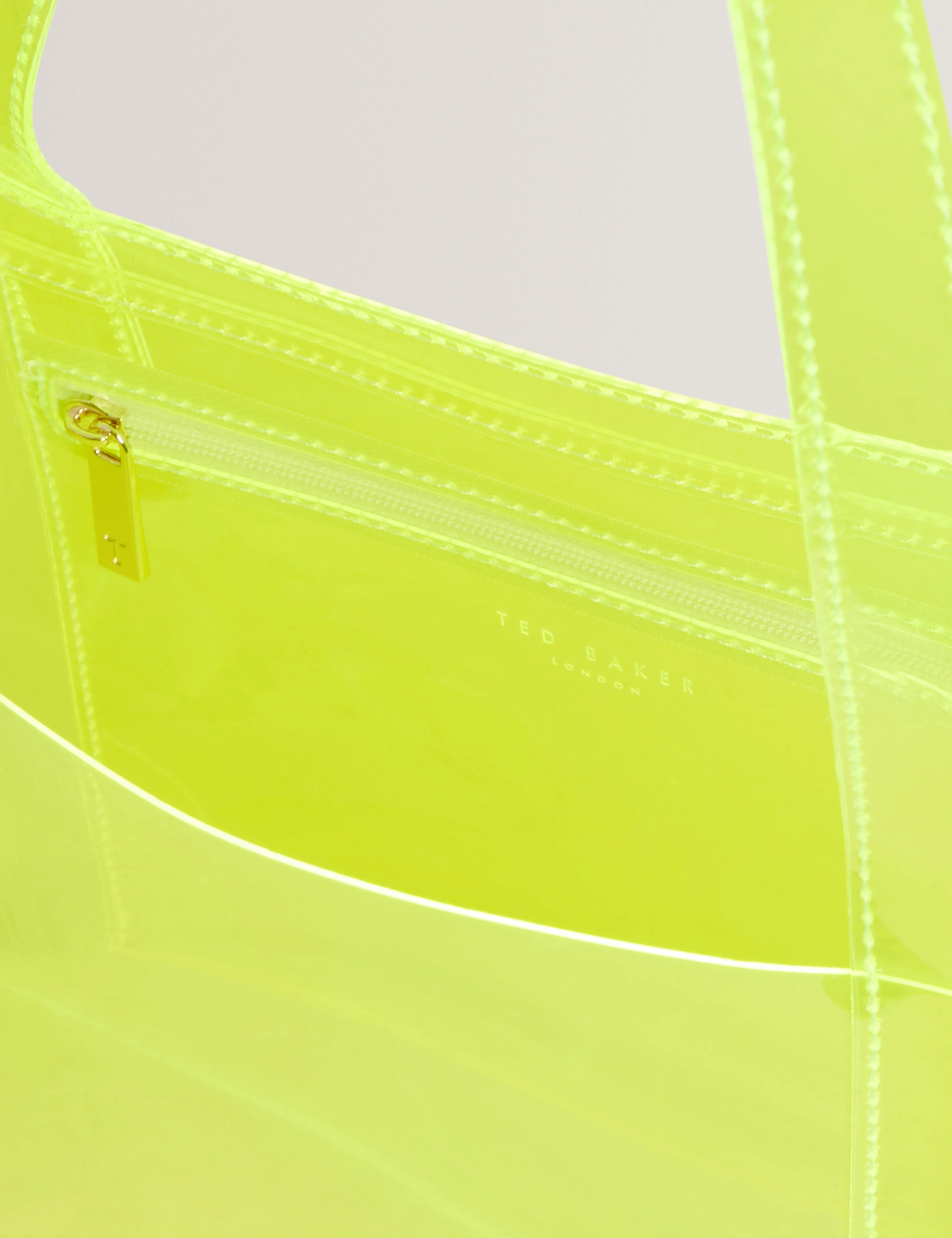 TED BAKER - SHEAKON
Wide Neon Clear Vinyl Icon Tote Bag